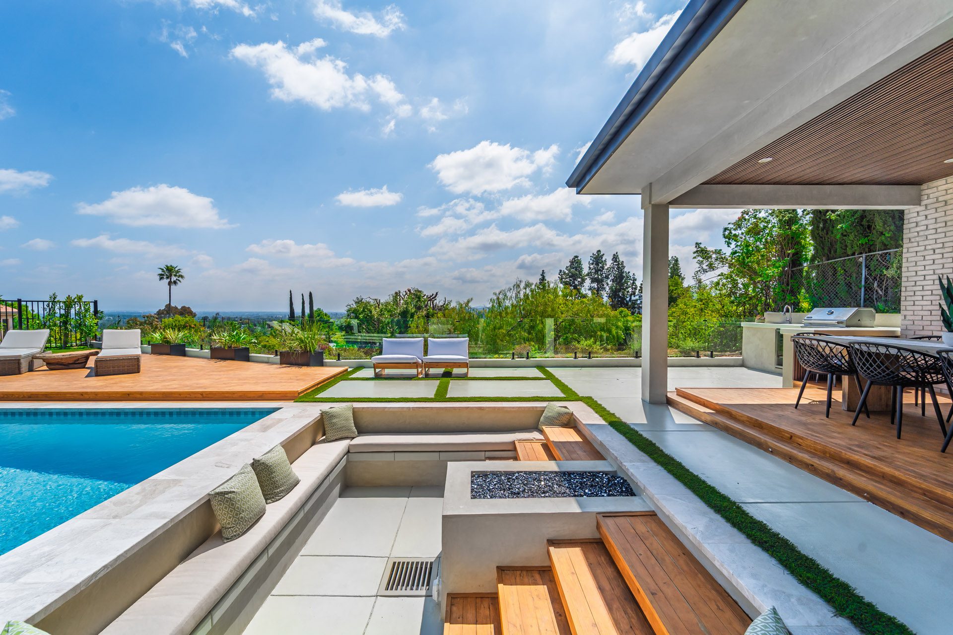 Pool terrace at Califa St with concrete pavers and timber decking