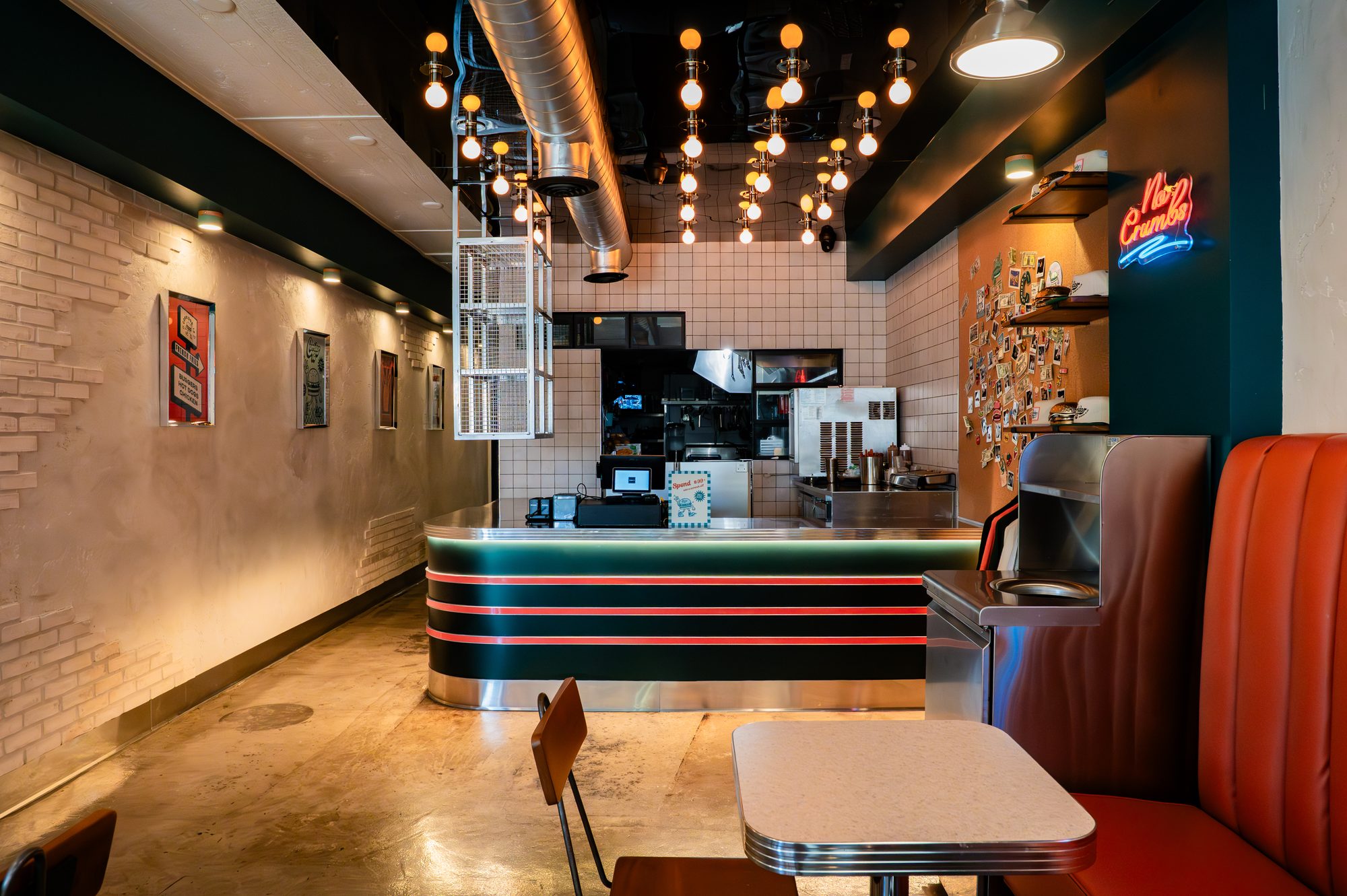 Corridor 18 order counter with chrome detailing and pendant lighting