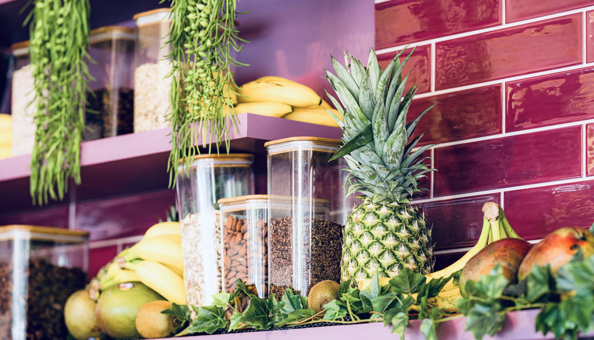 Fruit and topping display along the Nataly's Acai counter